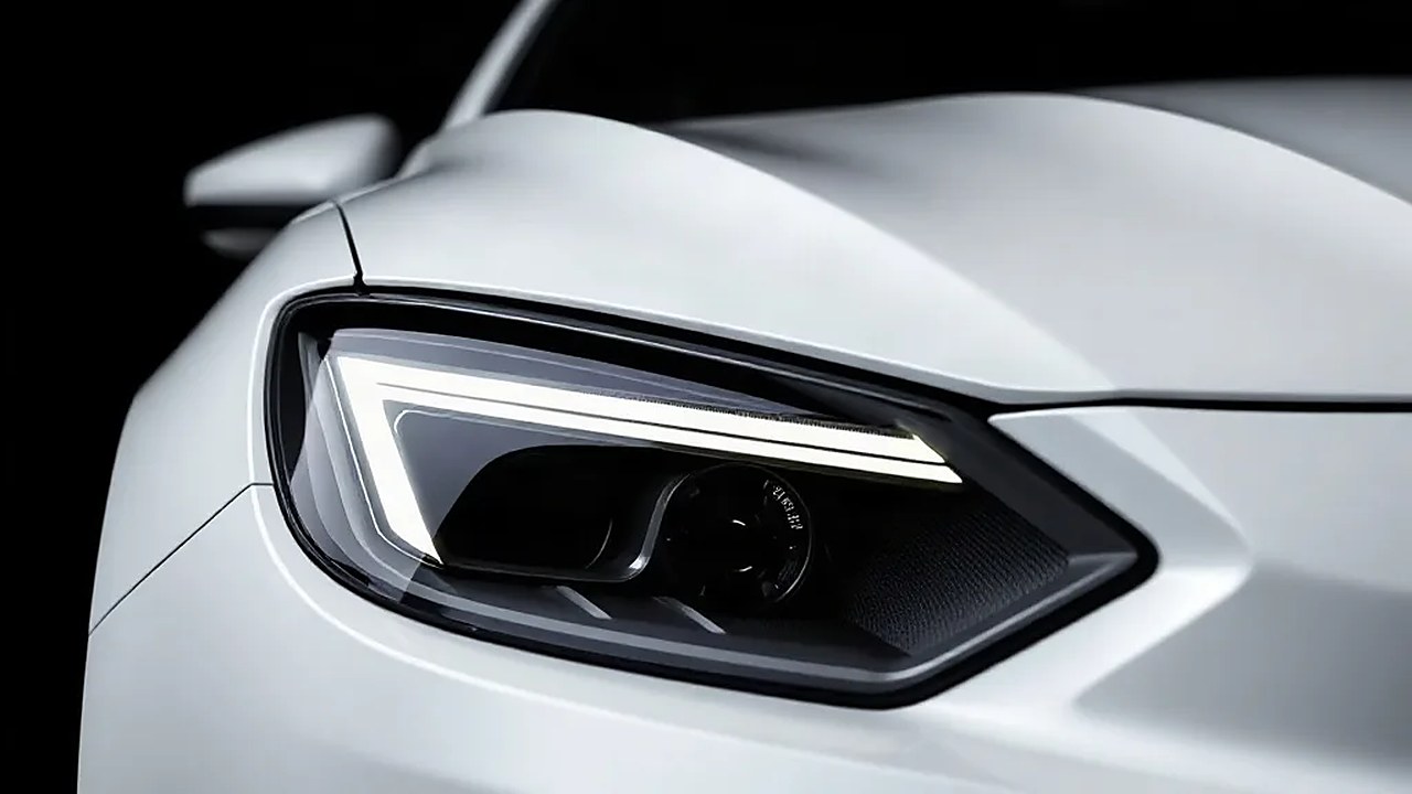 Beyaz gövde üzerinde iki çapraz LED çizgili far detayı; BMW 3 Serisi'nin Neue Klasse far imzası (Temsili görsel)